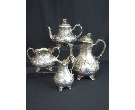 MATCHED FOUR PIECE SILVER TEA AND COFFEE SET comprising teapot, coffee pot, two handled sucrier and cream jug. Overall decora