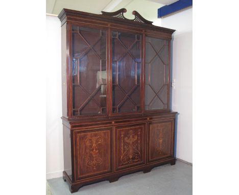 GOOD QUALITY EDWARDIAN INLAID MAHOGANY STRAIGHT FRONTED LIBRARY BOOKCASE having moulded dentil cornice over three astragal gl