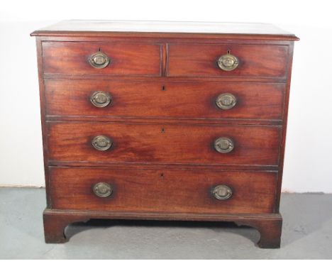 18TH CENTURY MAHOGANY STRAIGHT FRONTED CHEST OF TWO SHORT AND THREE LONG COCK BEADED AND GRADUATED DRAWERS all with brass ova