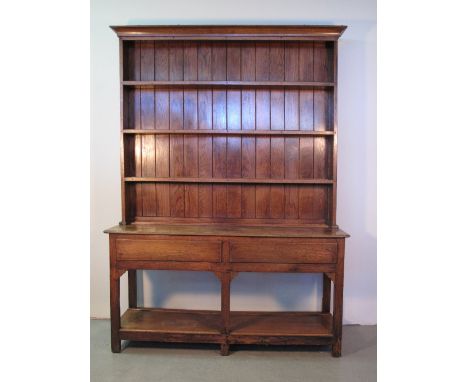 A PART LATE 18TH/EARLY 19TH CENTURY WELSH OAK POT BOARD DRESSER, now having later constructed boarded oak three shelf rack ba