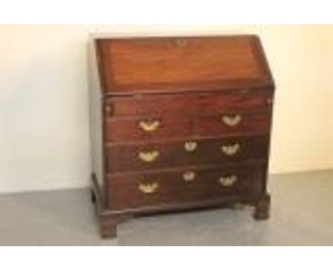 18TH CENTURY MAHOGANY FALL FRONT BUREAU, the moulded fall revealing stepped fitted interior, pigeon holes and drawers with a 