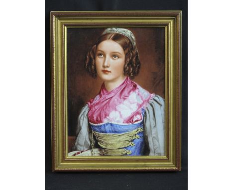 19TH CENTURY CONTINENTAL PORCELAIN PLAQUE printed with a portrait study of a young girl in regal dress with bonnet and laced 