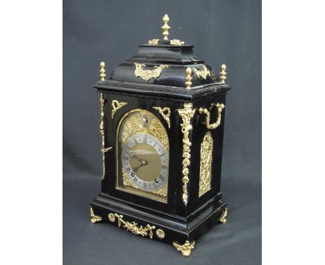 19TH CENTURY GILT METAL MOUNTED BLACK EBONISED GEORGIAN STYLE BRACKET CLOCK with caddy top having baluster finials and scroll