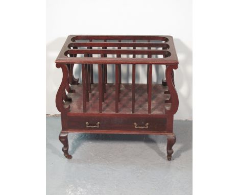 EARLY 20TH CENTURY MAHOGANY MUSIC CANTERBURY having scrolled supports, single frieze drawer and cabriole legs on ceramic cast