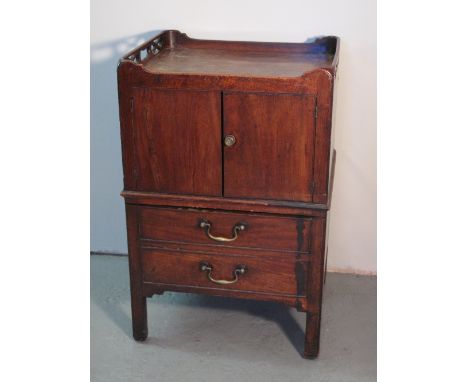 18TH CENTURY MAHOGANY NIGHT TABLE COMMODE having pierced gallery top above two blind doors, pull out section below fashioned 