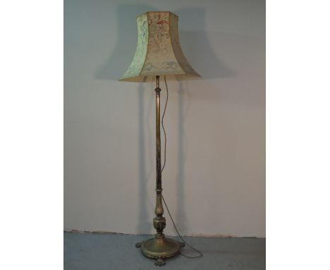 EARLY 20TH CENTURY ELECTROPLATED TELESCOPIC STANDARD LAMP having gun barrel shaped pedestal over vase shaped swag mounted bas