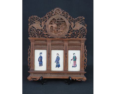 CHINESE CARVED WOODEN TRIPTYCH FRAME having foliate carved and pierced pediment with fantastic birds supporting two circular 