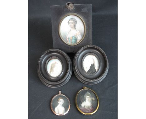 A GROUP OF 18TH CENTURY AND EARLY 19TH CENTURY PORTRAIT MINIATURES, comprising a pair, gentleman and lady facing with dates v