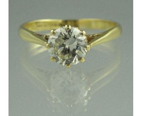 AN 18CT GOLD DIAMOND SOLITAIRE RING. The brilliant cut diamond an estimated 1.25cts. Ring size S.  CONDITION REPORT: Stone sl