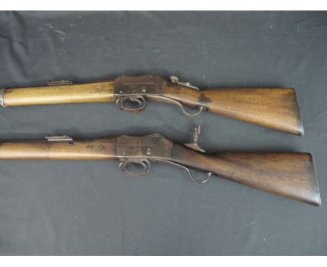 W. W. GREENER .22 MARTINI ACTION TARGET RIFLE, fully stocked with flip up peephole and ladder sight. 46.5" long. No. 022505. 