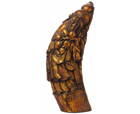 A GILT BAMBOO ROOT CARVING OF SHOU LAO 19th or early 20th Century, according to the inventory 47cm high 1.9kg Provenance: Pur