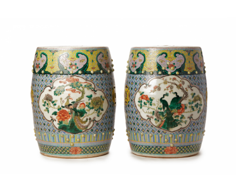 A PAIR OF 'FAMILLE VERTE' AND 'FAMILLE ROSE' GARDEN SEATS Of typical barrel shape, painted in enamels with reserves featuring