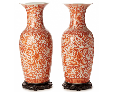 A PAIR OF LARGE IRON RED BALUSTER VASES Six character mark to base Decorated with lotus flowers amongst scrolling foliage wit