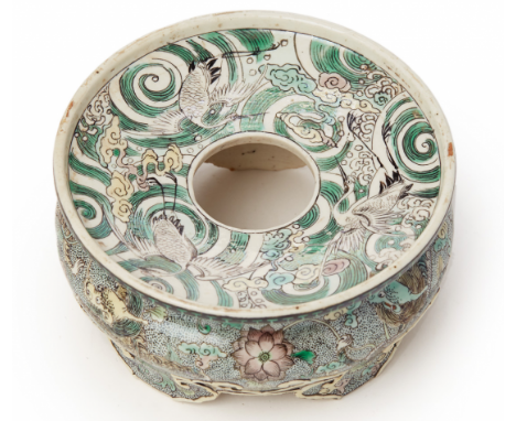 A 'FAMILLE VERTE' BISCUIT PORCELAIN STAND Probably Qianlong, according to the inventory Decorated with birds, beasts and flow