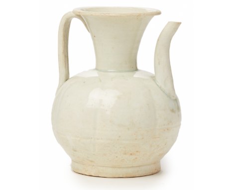 A QINGBAI PORCELAIN EWER Song Dynasty, according to the inventory The faintly lobed spherical body leading to a flared neck w