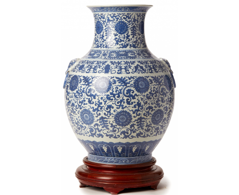 A LARGE BLUE AND WHITE HU FORM LOTUS VASE Qianlong six character seal mark to base Decorated with lotus flowers and scrolling