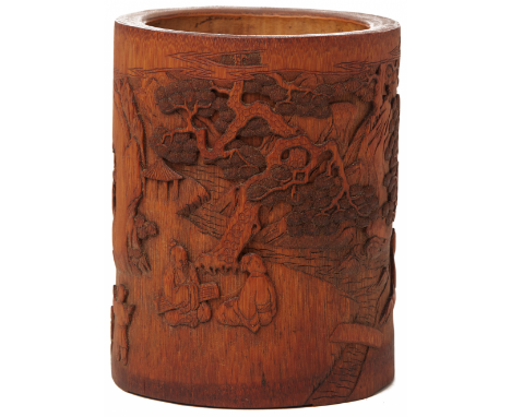 A LARGE CARVED BAMBOO BRUSH POT Carved with sages seated beneath pine trees in a river landscape 18cm high 600g
_____________