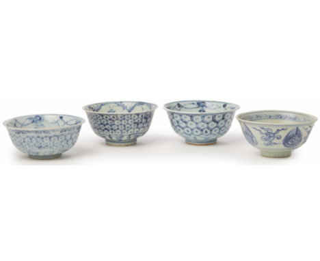 FOUR BLUE AND WHITE PORCELAIN BOWLS Early Ming Dynasty, according to the inventory Variously decorated, three with honeycomb 