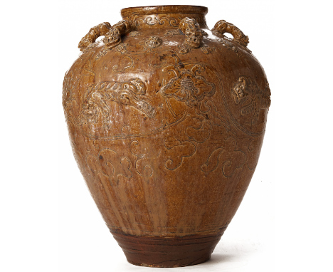 A LARGE MARTABAN TYPE POTTERY STORAGE JAR Probably Vietnamese The body decorated in relief with tigers amongst incensed styli