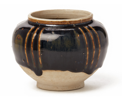 A SMALL CIZHOU TYPE BLACK GLAZED RIBBED JAR Song Dynasty, according to the inventory 9cm high / 380g Sold in a box (17cm x 17