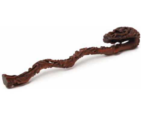 A CARVED BOXWOOD RUYI SCEPTRE 18th century, Qing Dynasty, according to the inventory Carved out of one piece in intricate des