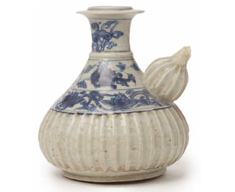 A BLUE AND WHITE PORCELAIN 'KENDI' Ming Dynasty, according to the inventory With fluted body and spout, the neck decorated wi