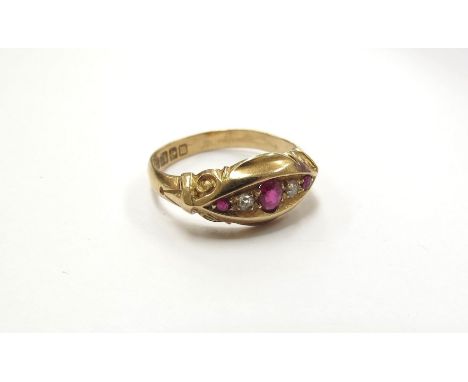 An 18ct gold ruby and diamond gypsy ring. Size M/N, 2.7g 