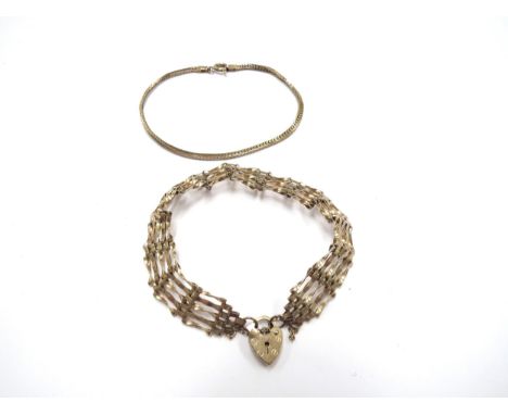 A 9ct gold gate bracelet, 18cm long and a 9ct gold flat link bracelet, 18cm long, 8.4g 