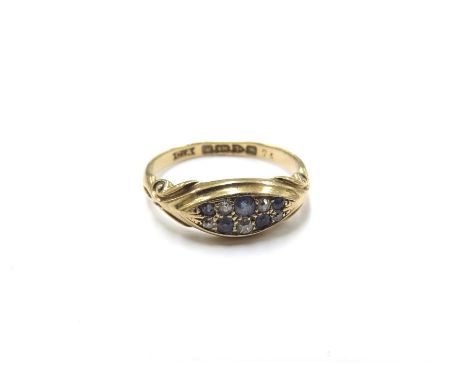 An 18ct gold Chester hallmark sapphire and diamond cluster ring. Size N, 3.3g 