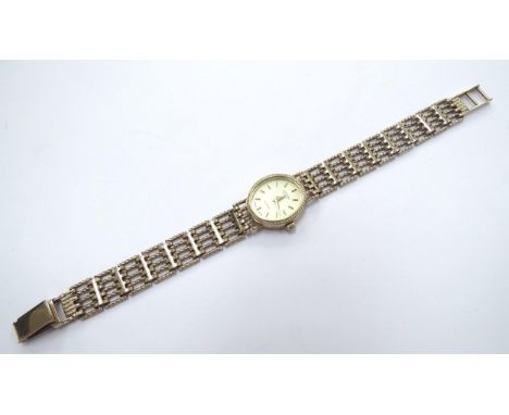 A 9ct gold Rotary wristwatch with 9ct gold strap, 14g total 