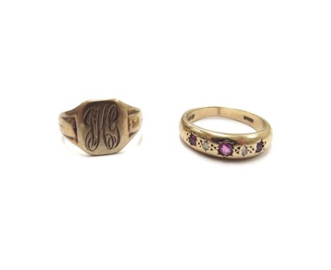 A 9ct gold monogrammed signet ring, size I, 2.8g and a 9ct gold ruby and diamond gypsy ring in rub over setting, worn. Size M