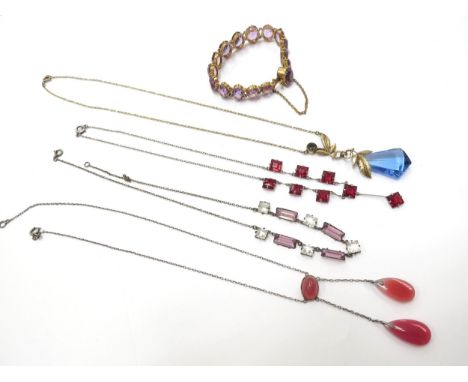 An amethyst coloured stone set gilt bracelet and four coloured glass drop necklaces (5) 