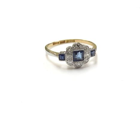 An Art Deco style square cut sapphire and diamond ring, stamped 18ct/plat. Size P, 2.3g 