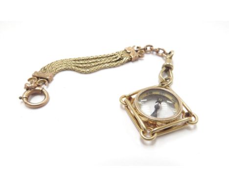 A 9ct gold two tone strap hung with a compass, 14cm long, 15.2g total 