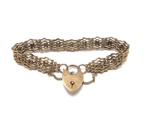 A 9ct gold gate bracelet with heart padlock, 18cm long, 15.8g 