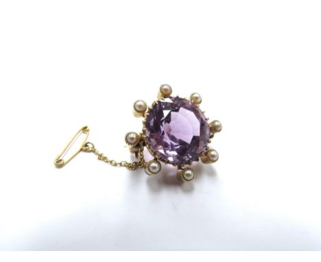 An amethyst and pearl brooch, unmarked 