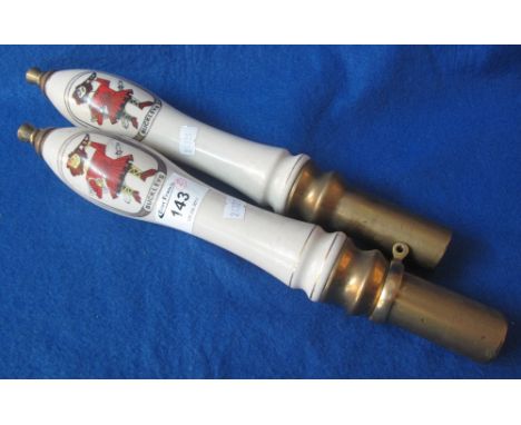 Pair of brass and ceramic 'Buckleys' beer engine handles. (2)(B.P. 24% incl. VAT)
