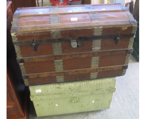 Vintage canvas wooden and metal banded domed topped trunk, together with a vintage tin trunk. (2)(B.P. 24% incl. VAT)
