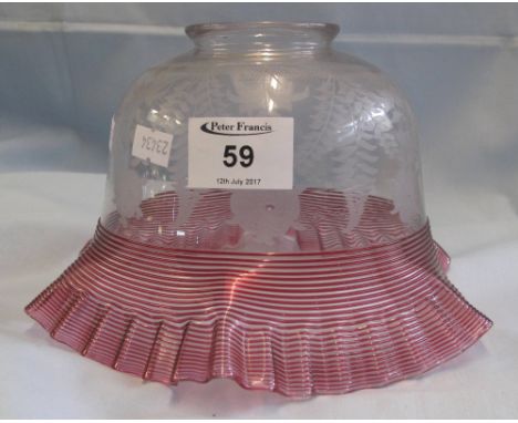 Wheel engraved glass oil lamp shade with reeded and fluted cranberry glass rim.(B.P. 24% incl. VAT)