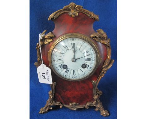 19th Century French tortoiseshell veneered, balloon shaped, two train mantel clock with gilt metal mounts, enamelled face and