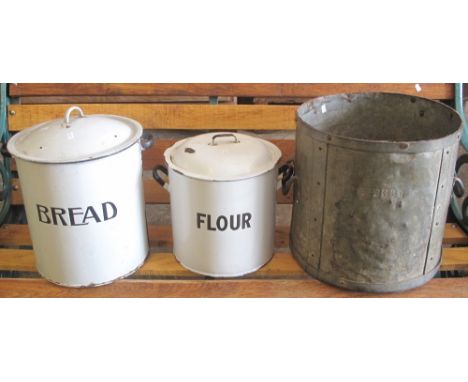 Vintage bread and flour two handled enamel lidded bins, together with a two handled bushel grain measure. (3)(B.P. 24% incl. 