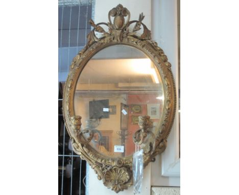 19th Century gilt gesso foliate framed, oval mirror with candelabra.(B.P. 24% incl. VAT)