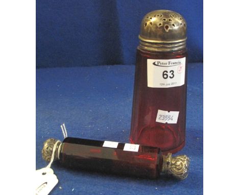 Victorian ruby glass faceted double ended scent bottle with metal end caps, together with a cranberry glass caster with white