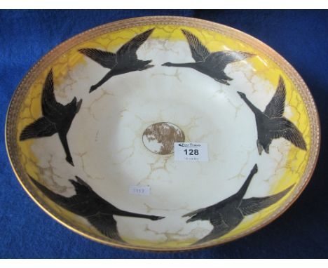 Royal Worcester porcelain shallow bowl decorated with a continuous band of black swans in flight amongst clouds.  Printed mar