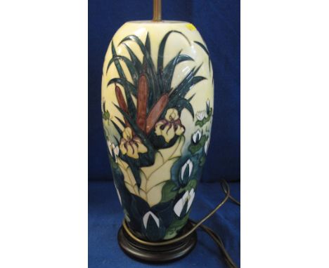 Modern Moorcroft Art Pottery ovoid cream ground lamp base, overall decorated with tube lined designs of water lilies, bull ru