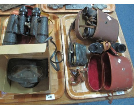 Two trays to include various binoculars including: Universal Camera Corp., New York; Panorama and Dollond, together with a pa