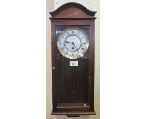 Modern Comitti of London three train wall clock.(B.P. 24% incl. VAT)
