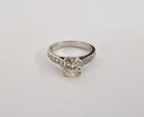 Iliana solitaire diamond ring, the stone approx. 1.2 cts, and having 5 each diamond set shoulders, on white metal, size MCond