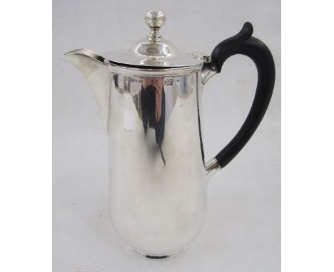 1920s silver hot water jug&nbsp;with ball finial, ebonised scroll handle, tapered on circular foot, Sheffield 1925, 21cm high