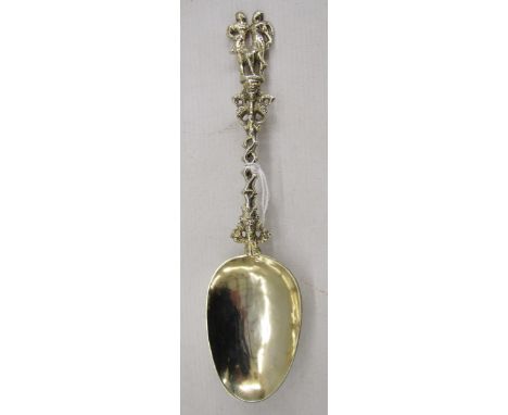 Three Victorian silver gilt embossed and pierced spoons, each having ornate finial, hallmarked London 1863, by EP, together w